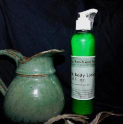 8 oz bottle hand and body lotion made with emu oil from 3 Feathers Emu Ranch